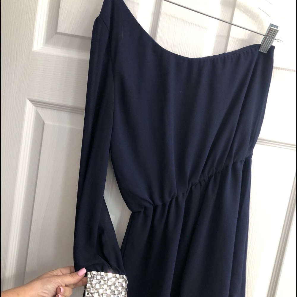 Romper, one sheer sleeve, w/ bling on cuff.